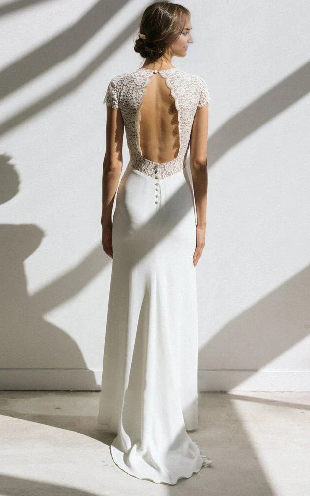 Vestido de novia sencillo de corte imperio, manga corta, largo hasta el suelo, cola larga, de gasa y escote en V