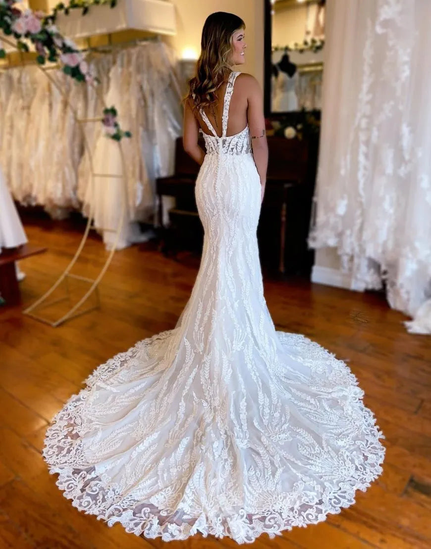 Vestido de novia sexy de sirena con tirantes y cola de corte en encaje y abertura