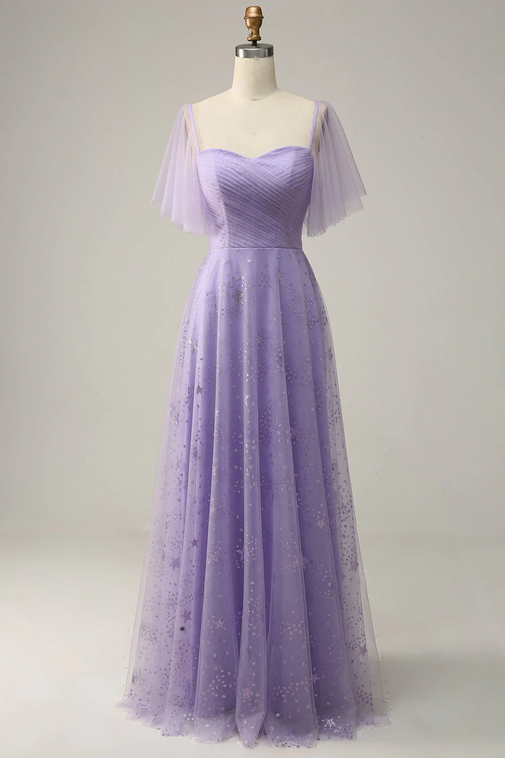 Vestido de fiesta lavanda con hombros descubiertos y volantes