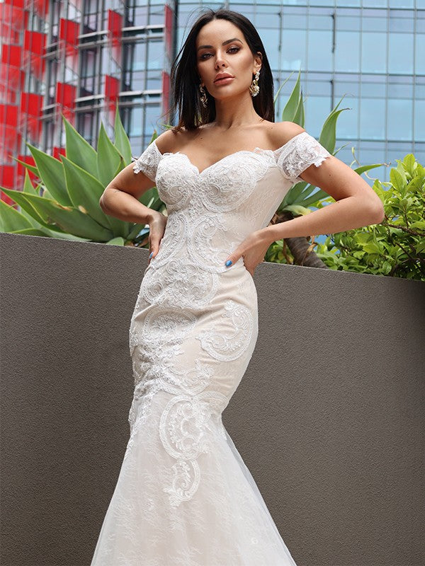 Trumpet/Mermaid Tulle Applique Off-the-Shoulder Sleeveless Sweep/Brush Train Wedding Dresses