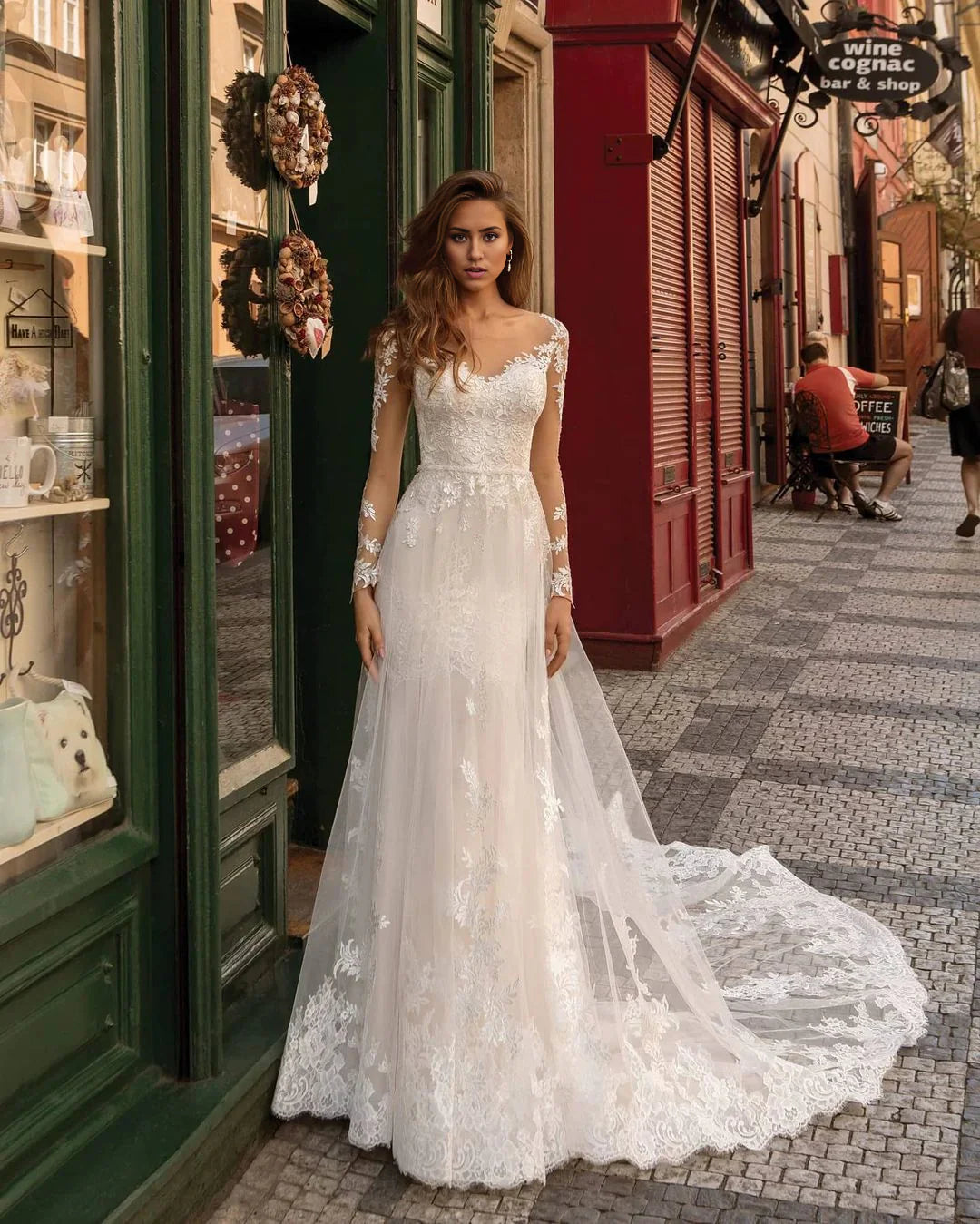Vestidos de novia de encaje con mangas largas y corte sirena