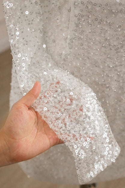 Vestido de novia de manga larga con lentejuelas y espalda descubierta