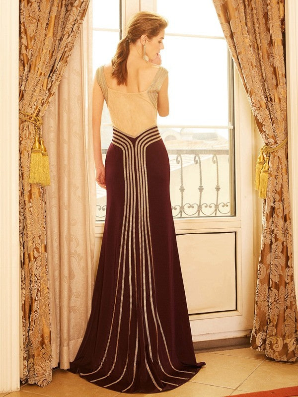 Vestidos de jersey con escote tubo/columna, sin mangas, con abalorios y cola larga