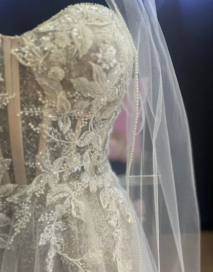 A-Linien-Brautkleid aus Tüll mit herzförmigem Ausschnitt und Applikationen 