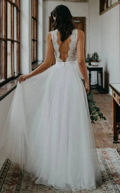 Vestido de novia sin mangas con escote festoneado y encaje en forma de A