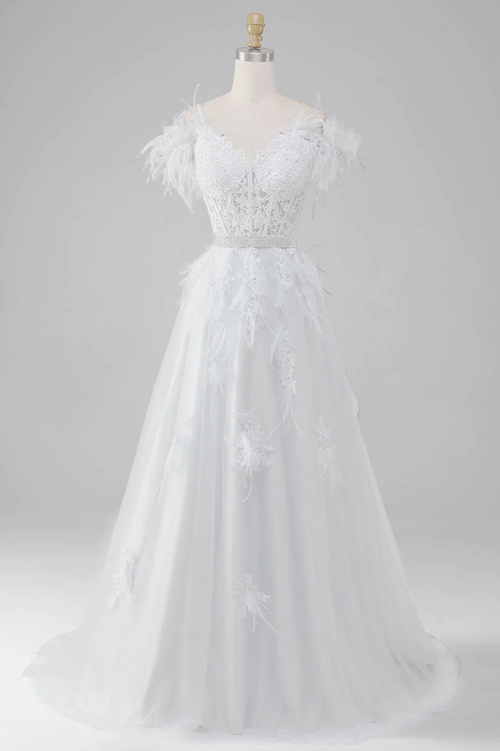 Vestido de novia con corsé blanco, apliques y detalles de pedrería