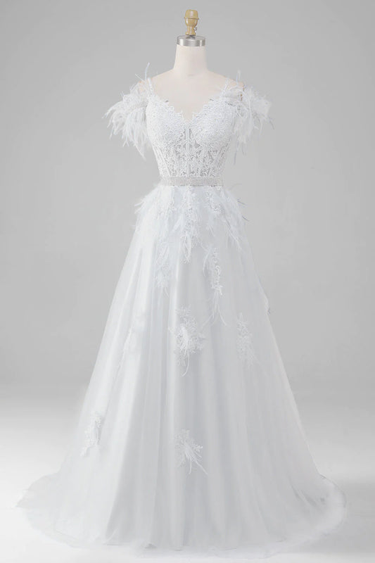 Vestido de novia con corsé blanco, apliques y detalles de pedrería
