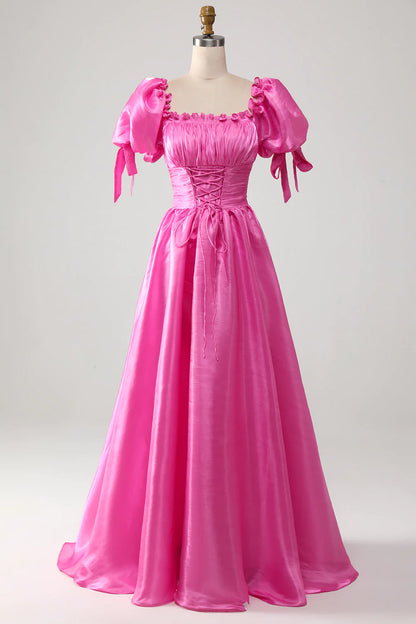 Vestido de fiesta rosa intenso con mangas abullonadas y volantes