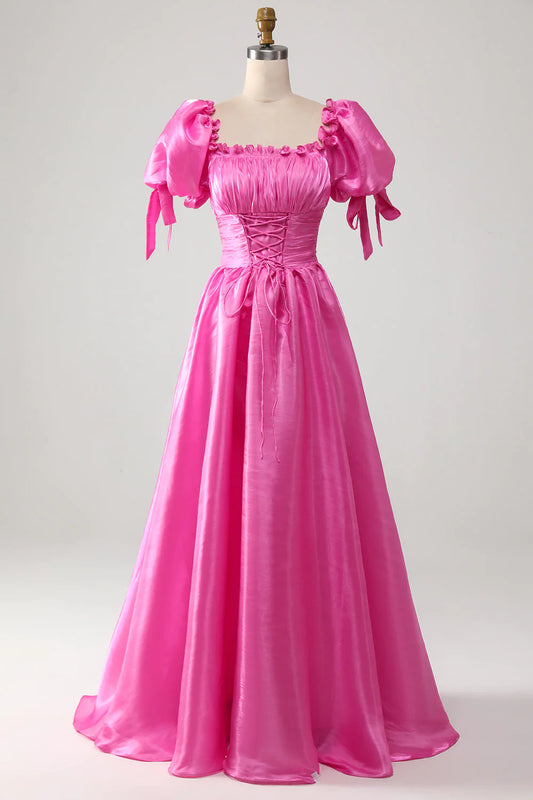 Pinkes Ballkleid mit Puffärmeln und Rüschen