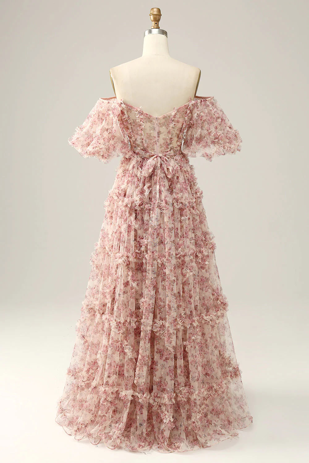 Vestido de fiesta con hombros descubiertos y flores en color rojo marfil