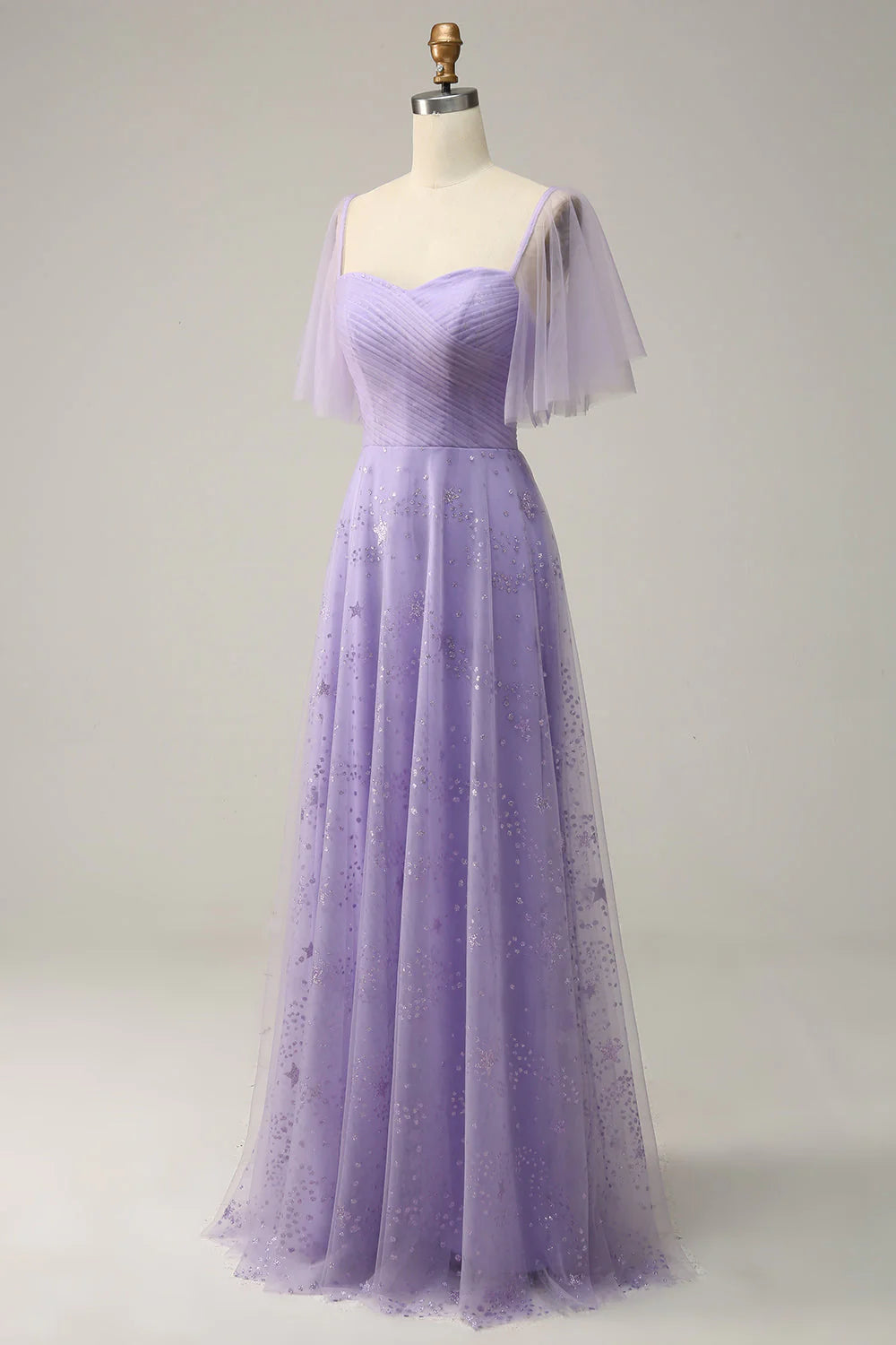 Vestido de fiesta lavanda con hombros descubiertos y volantes