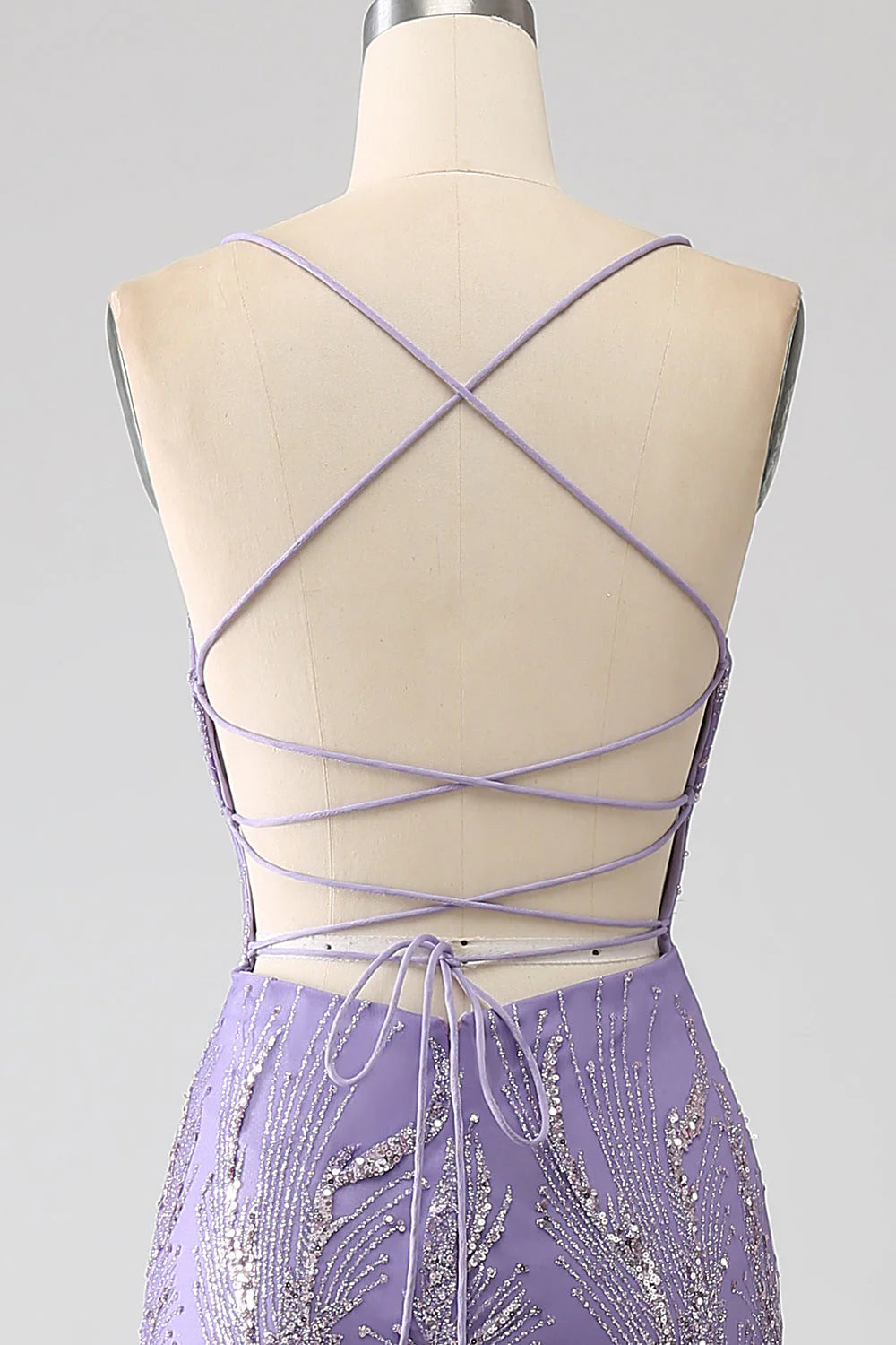 Vestido de fiesta largo color lila con corte sirena brillante