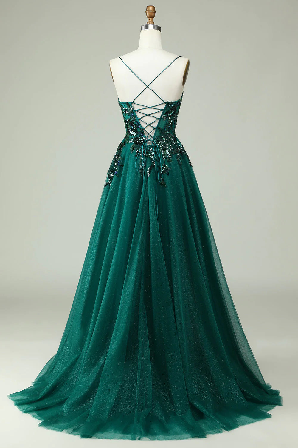 Vestido de fiesta verde oscuro con corsé, tirantes finos y apliques