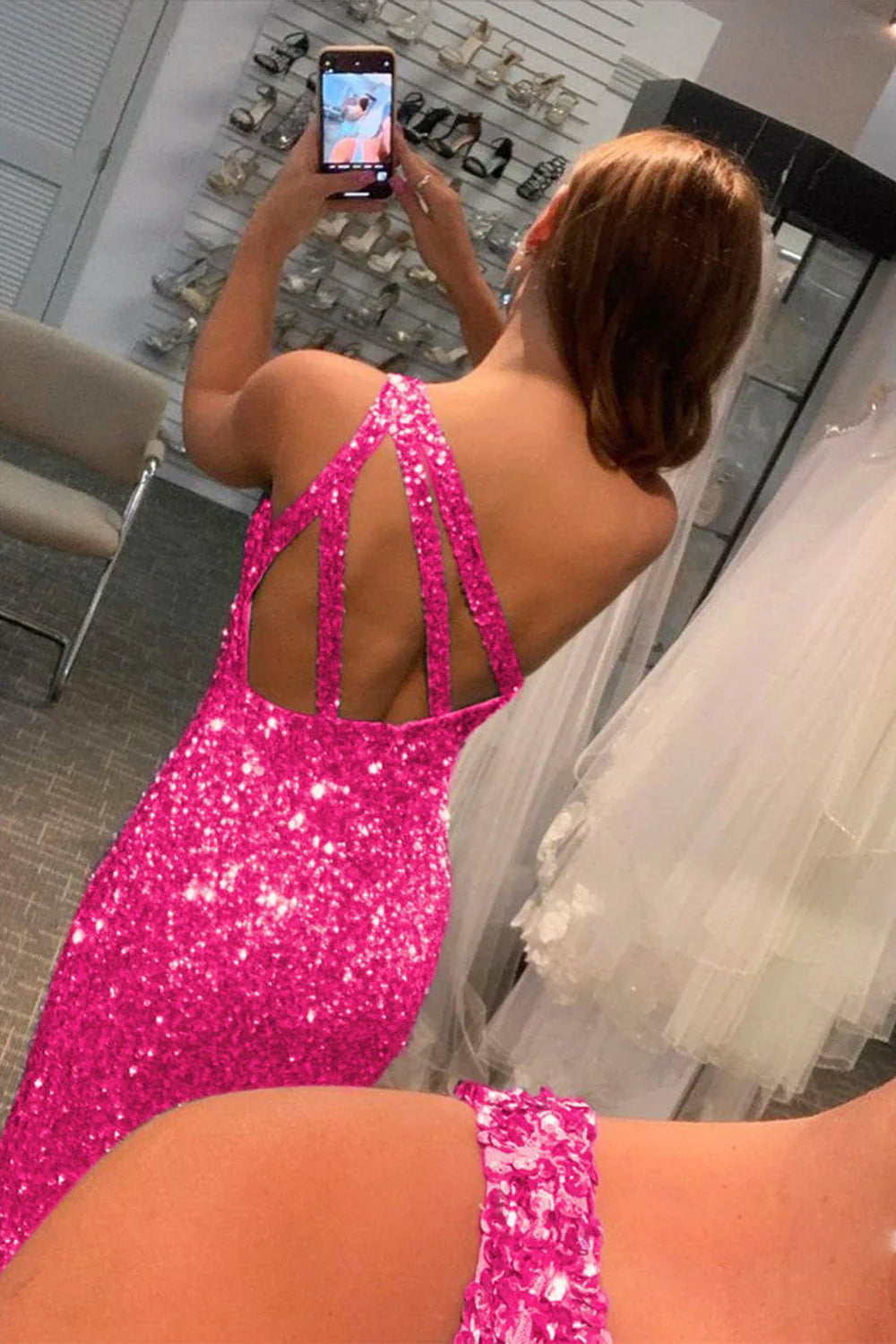 Vestido de fiesta largo con lentejuelas y purpurina con abertura