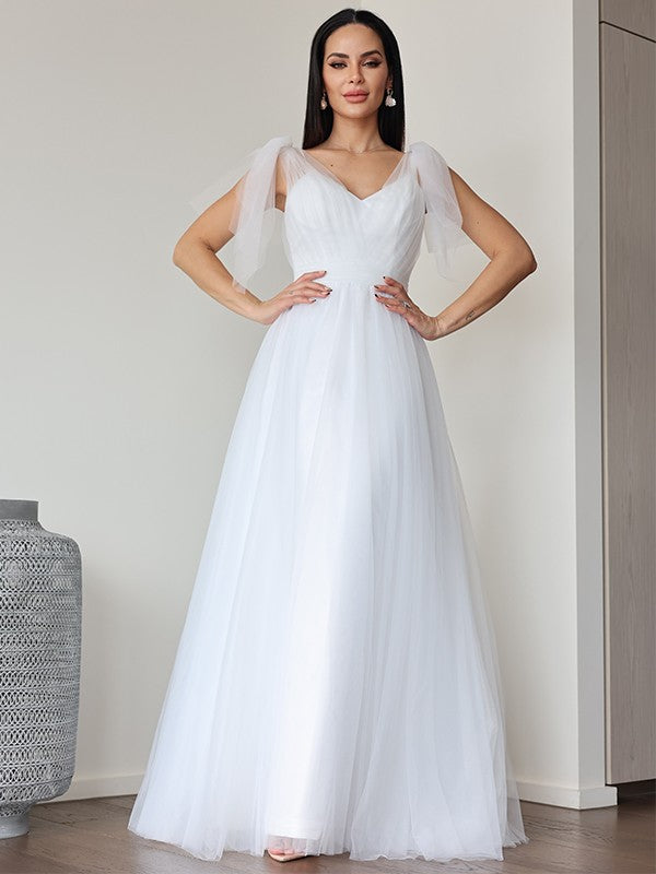 Vestidos de novia de corte A/princesa, de tul, con volantes, escote en V, sin mangas y hasta el suelo