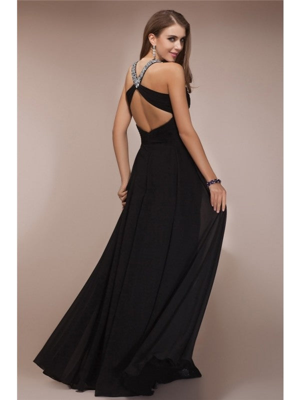 Vestidos largos de gasa con cuello halter, sin mangas y con abalorios