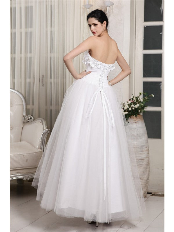 Vestidos de novia largos de organza con escote corazón, sin mangas y cuentas