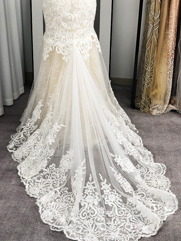 Vestidos de novia de corte trompeta/sirena con apliques de tul, escote redondo, sin mangas y cola larga