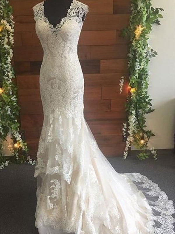 Vestidos de novia de tul con encaje, escote en V, sin mangas y cola larga