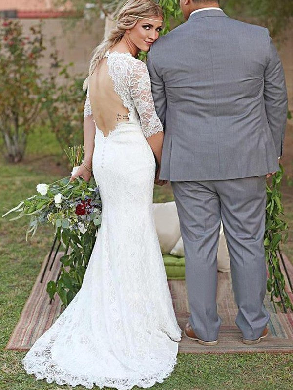 Vestidos de novia con escote barco, encaje, manga 1/2 y cola larga