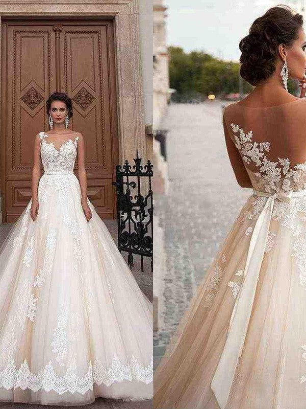 Vestidos de novia de corte A/princesa, de tul, con apliques redondos, sin mangas y cola de corte