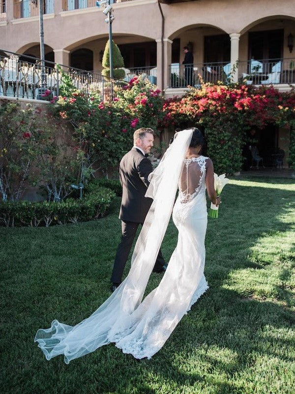 Vestidos de novia de tul, sin mangas, con escote en V y cola larga