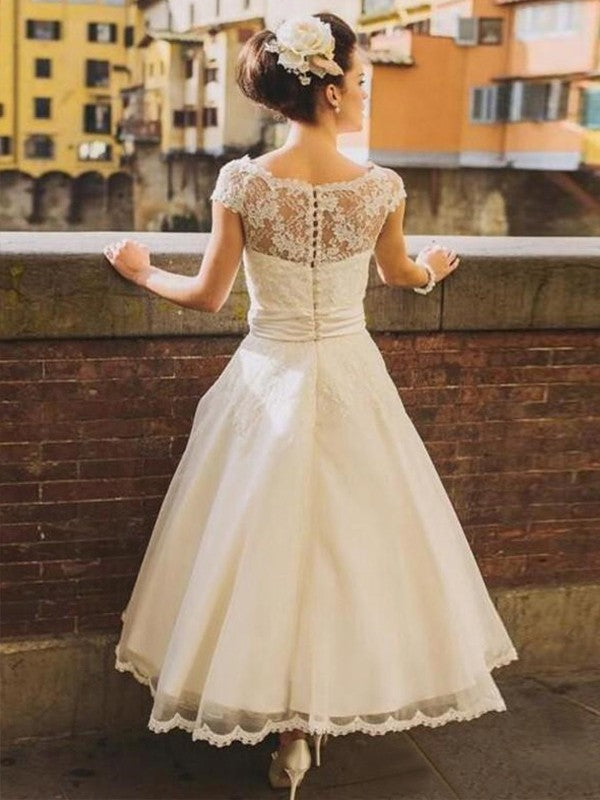 Vestidos de novia de corte A/princesa, con tul, encaje, escote redondo, mangas cortas y largo hasta la rodilla